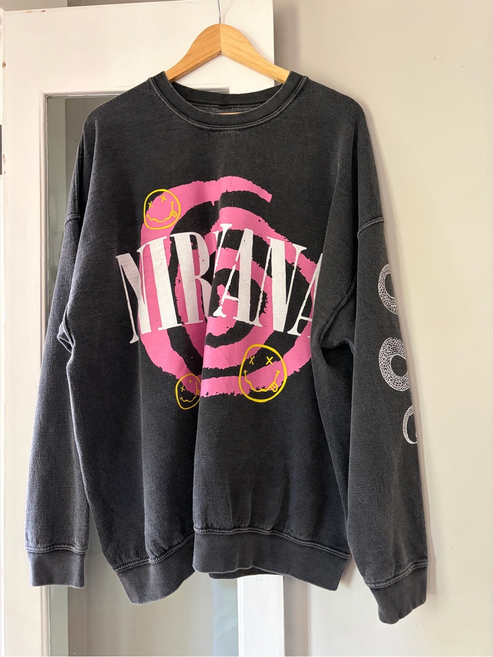 NIRVANA Black Sweatshirt with Pink Spiral and Yellow Accents